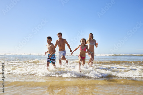 Photography Family On Summer Beach Vacation Run Out Of Sea Towards Camera