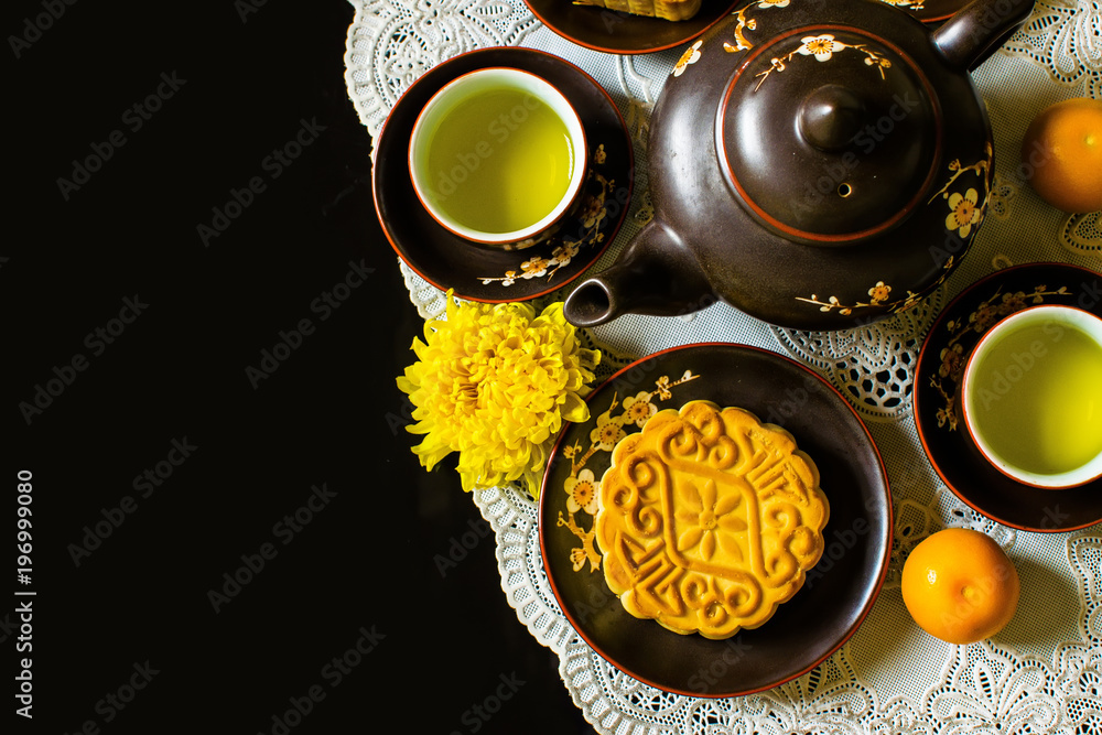 Moon cakes for the Chinese Mid-autumn festival isolated on black background Moon cakes for the Chinese Mid-autumn festival isolated on black background