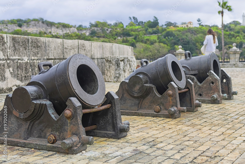 The old gun on the wooden gun carriage fires cast-iron and stone The old gun on the wooden gun carriage fires cast-iron and stone