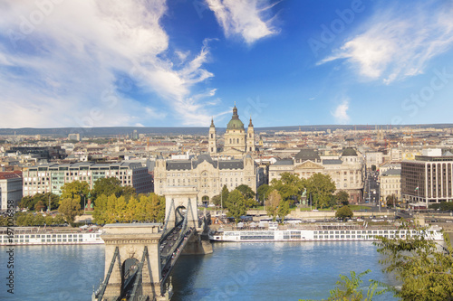 Beautiful view of the Basilica of Saint Istvan and the Szechenyi chain bridge across the Danube in Budapest, Hungary © marinadatsenko