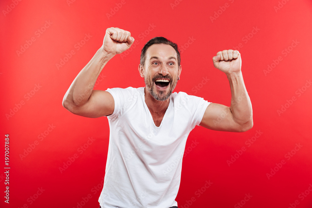 Excited happy adult man looking aside. Excited happy adult man looking aside.
