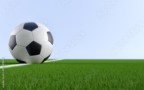 Soccer ball on the white line of a soccer field. Copy space on the right side - 3D Rendering © Marius Faust