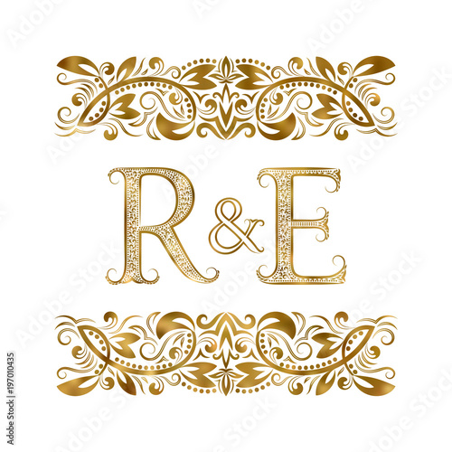 R and E vintage initials logo symbol. The letters are surrounded by ornamental elements. Wedding or business partners monogram in royal style.