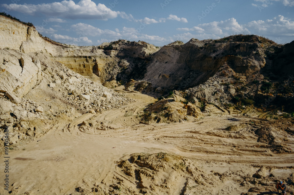 Opencast mining quarry. This area has been mined for sand and other minerals. Restoration of a part of the mined glass sand quarry. Dunes of the sand quarry. Landscapes and Nature