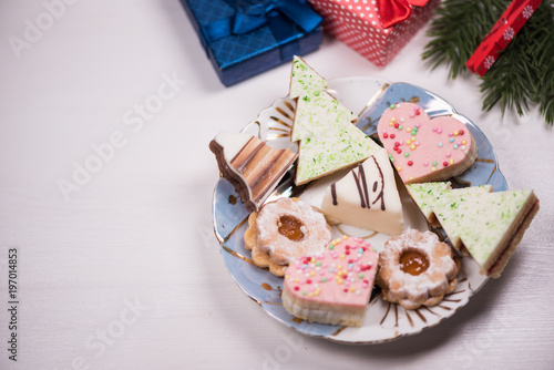 Traditional celebration festive homemade decorated sweets on wooden background