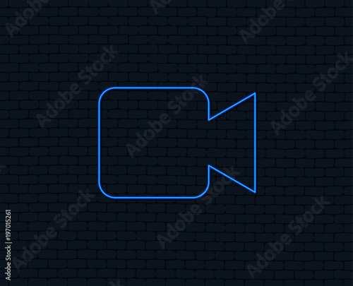 Neon light. Video camera sign icon. Video content button. Glowing graphic design. Brick wall. Vector