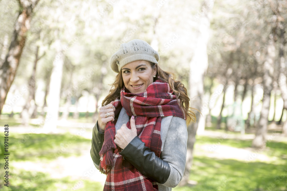 Pretty woman posing in the park