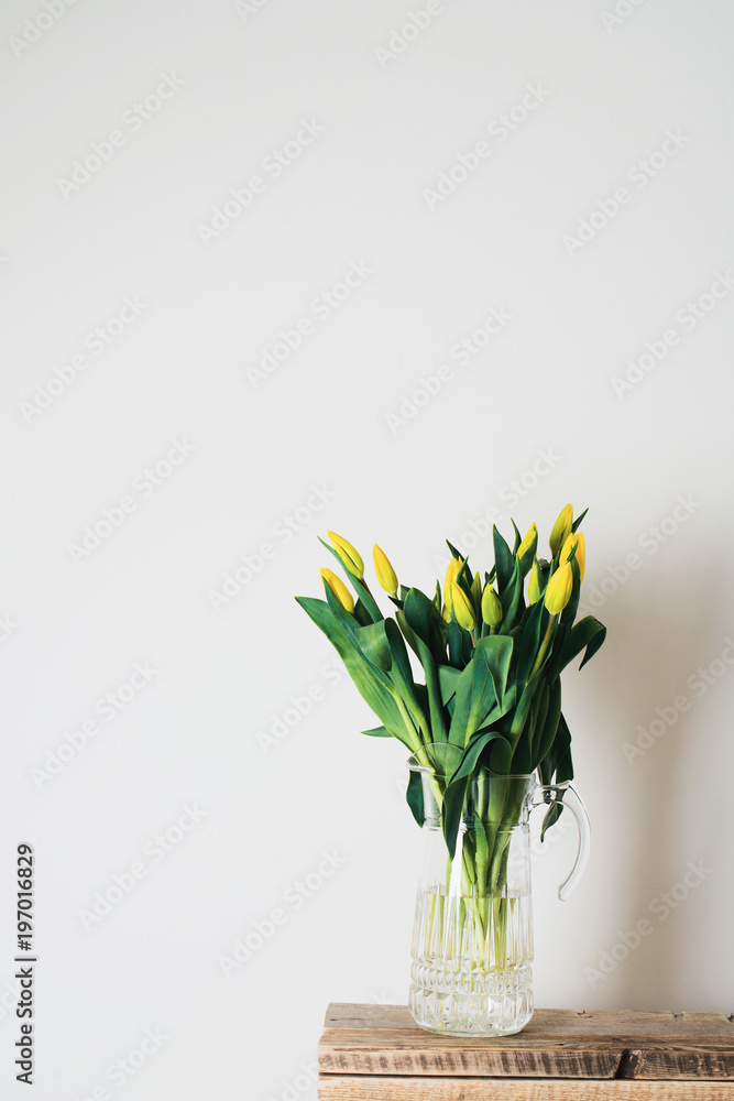 Bouquet of tulips in vase over white background Bouquet of tulips in vase over white background