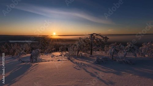 Timelapse, sunset from a fell in Lapland in winter