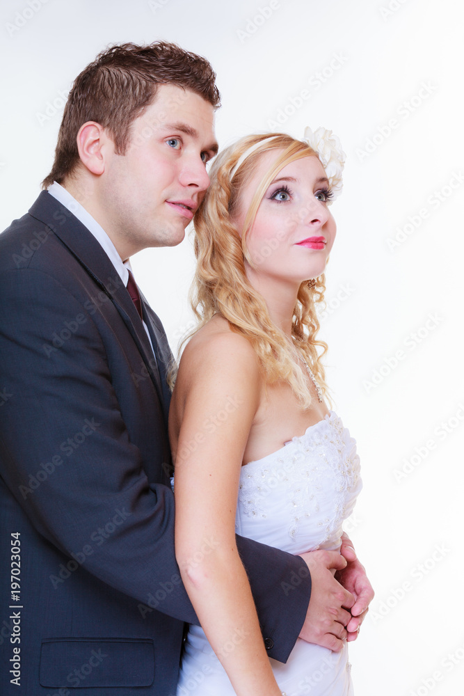 Happy groom and bride posing for marriage photo Happy groom and bride posing for marriage photo