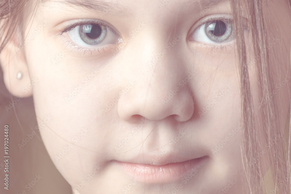Fototapeta premium Portrait of a young beautiful girl. Toned
