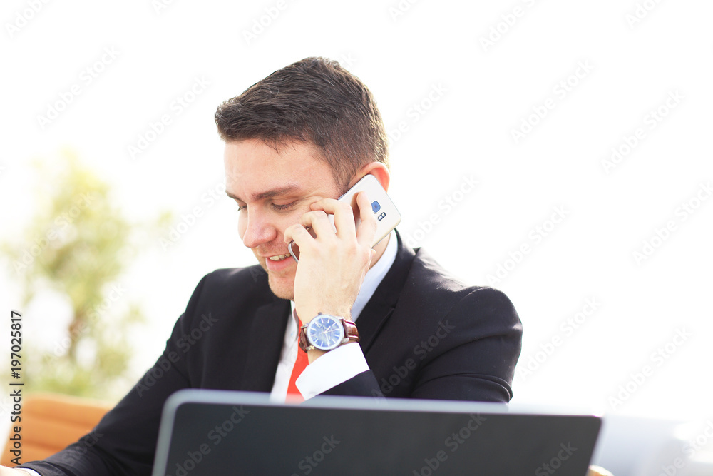 Elegant businessman analyzing data in office Elegant businessman analyzing data in office