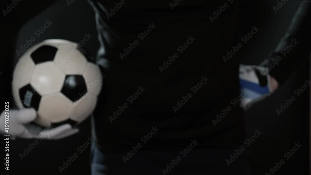 close up goalkeeper holding soccer ball in the stadium studio football player hands professional close up goalkeeper holding soccer ball in the stadium studio football player hands professional