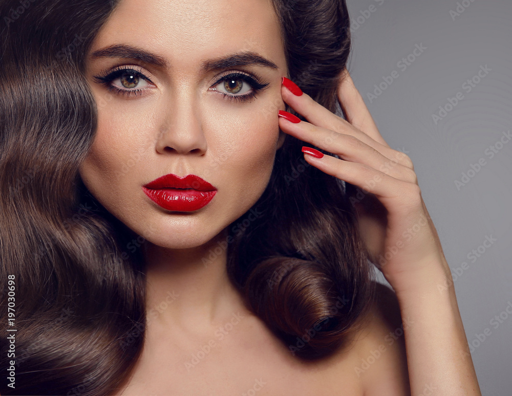 Beauty makeup. Elegant woman portrait with red lips and manicured