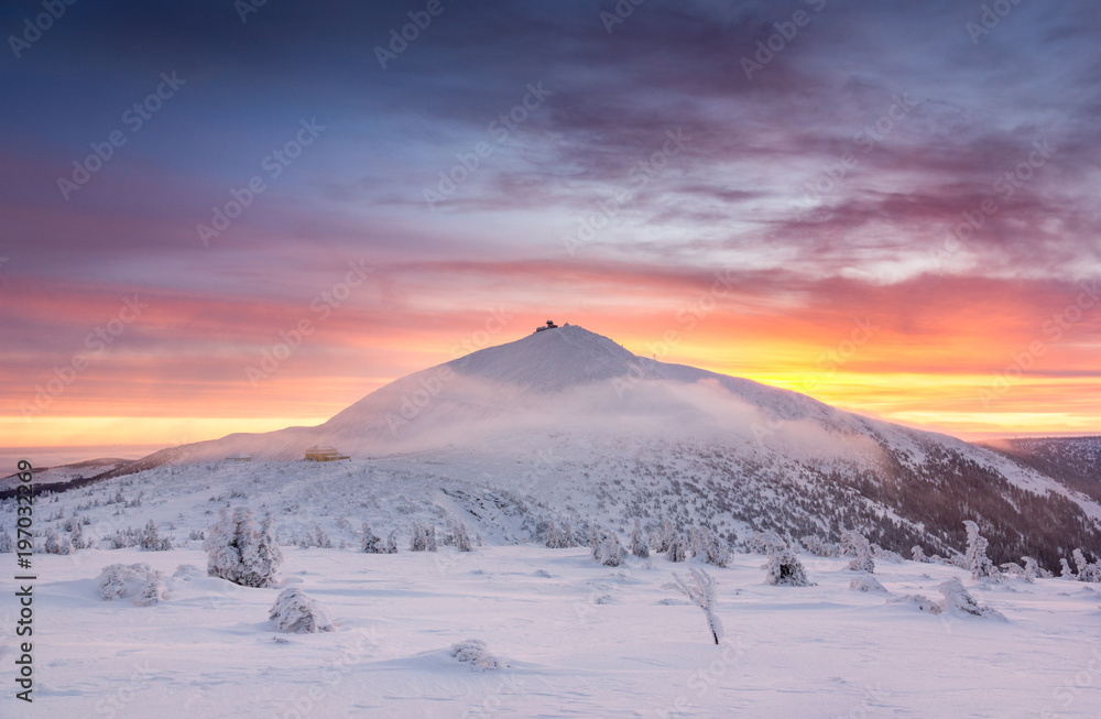 Winter dawn over the Sniezka mount in the Giant Mountains, Karkonosze, Poland