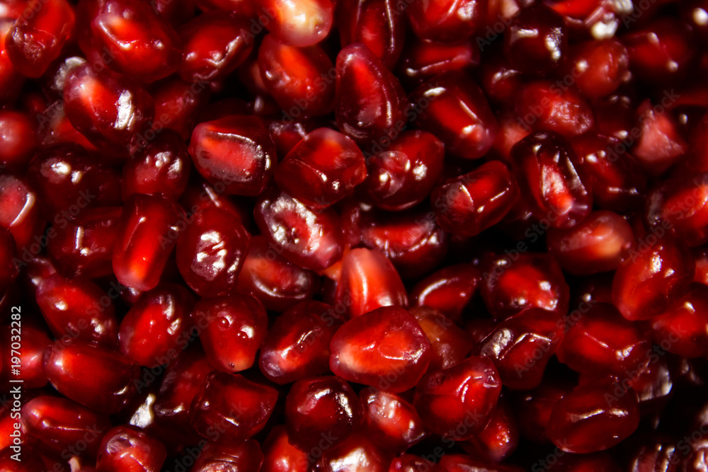 Food background of the fresh ripe pomegranate seeds Food background of the fresh ripe pomegranate seeds