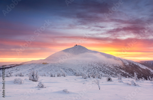 Winter dawn over the Sniezka mount in the Giant Mountains, Karkonosze, Poland photo