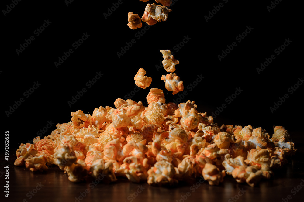 Fresh and warm salty popcorn with cheese Fresh and warm salty popcorn with cheese