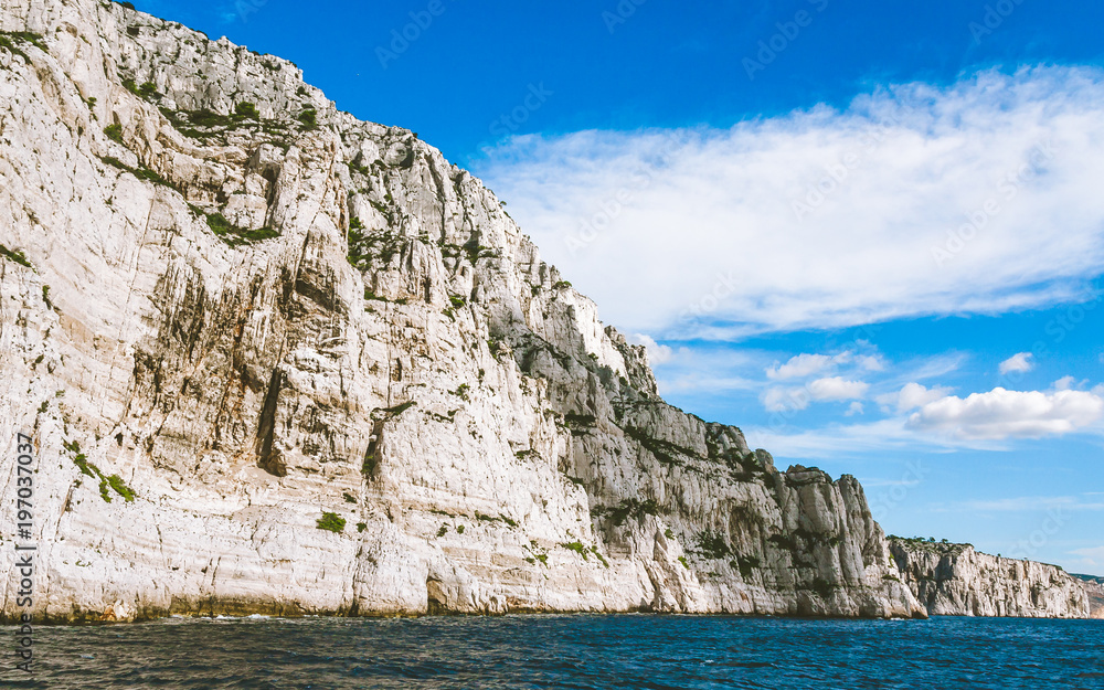White cliffs of Massif des Calanques on sunny day in Cassis, France