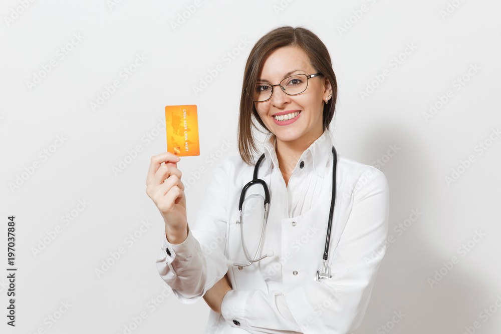 Smiling attractive doctor woman with stethoscope isolated on white background. Female doctor in medical gown showing blank business credit card. Healthcare personnel, health, finance medicine concept. Smiling attractive doctor woman with stethoscope isolated on white background. Female doctor in medical gown showing blank business credit card. Healthcare personnel, health, finance medicine concept.
