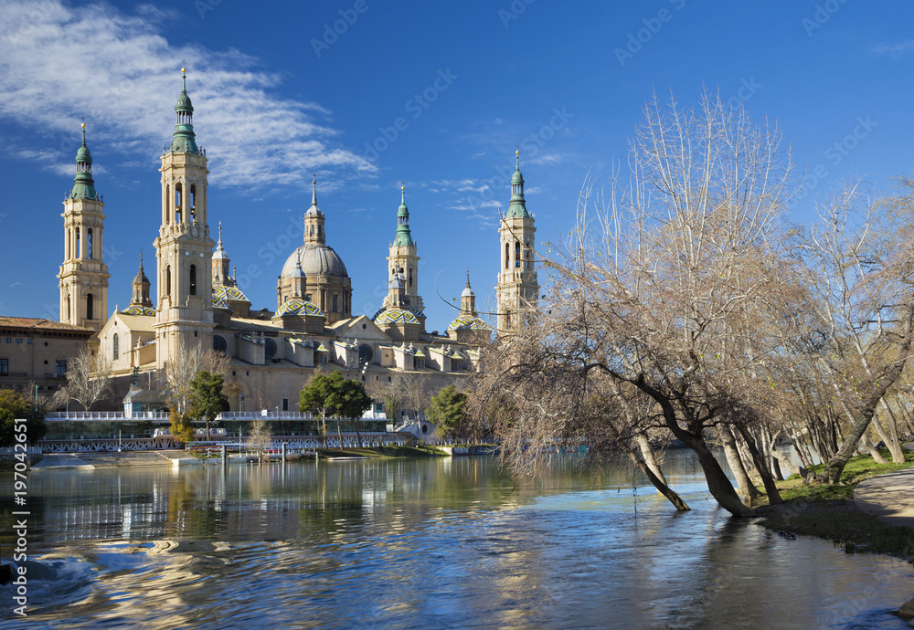 Zaragoza - The Basilica del Pilar with the riverside of Ebro river in the morning light.