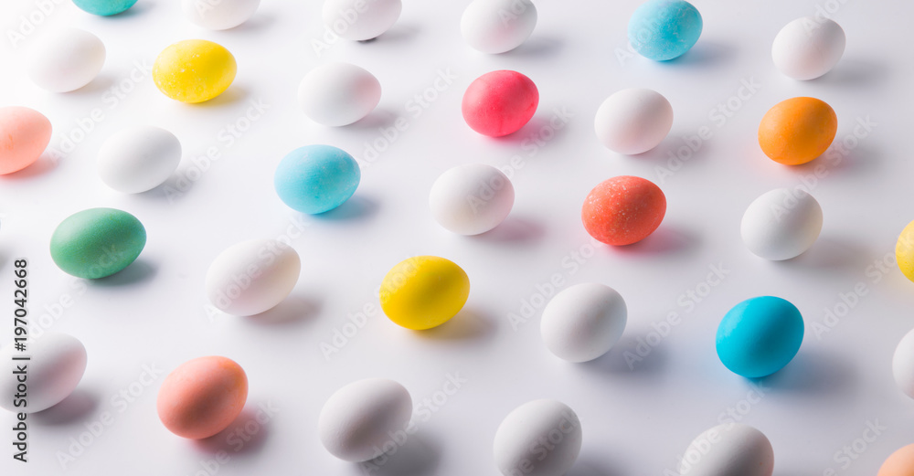 Eggs flat lay on a white background. Easter and spring composition. Eggs flat lay on a white background. Easter and spring composition.
