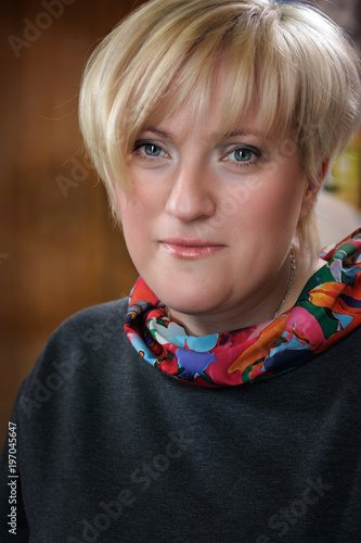 Portrait of a blonde woman with a fashionable haircut