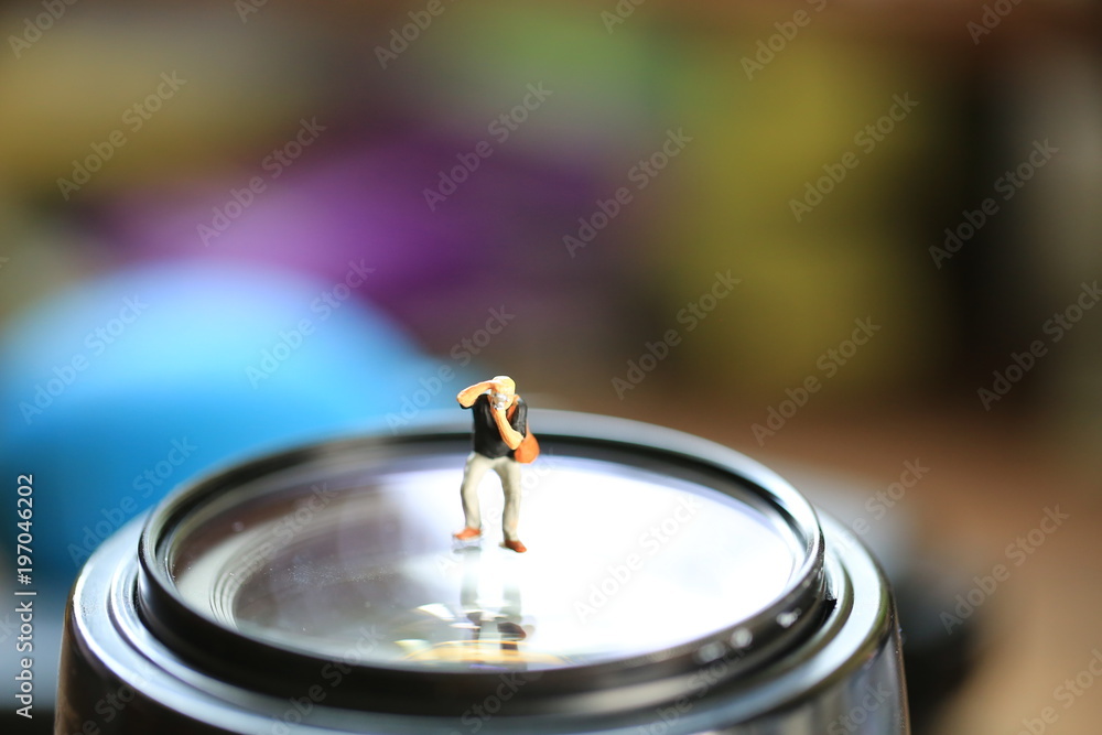 Obraz premium photographer man on lens