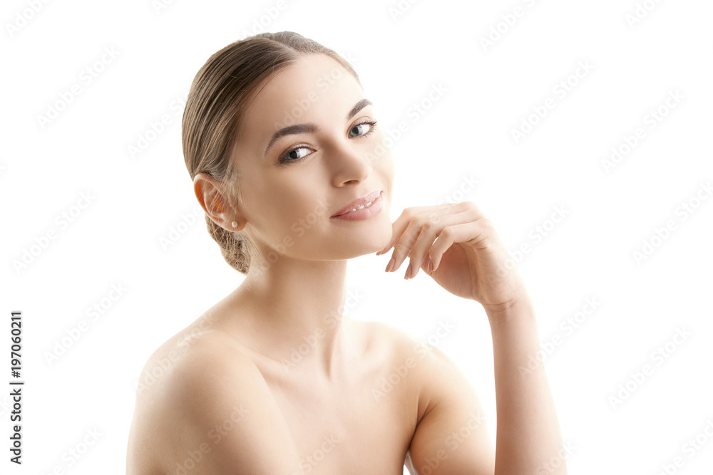 Healthy glowing skin. Portrait of beautiful young woman with toothy smile and radiant skin posing at isolated white background. Healthy glowing skin. Portrait of beautiful young woman with toothy smile and radiant skin posing at isolated white background.