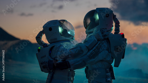 Leinwand Poster Two Astronauts in Space Suits Hugging on Alien Planet, Exploration of the the Planet's Surface