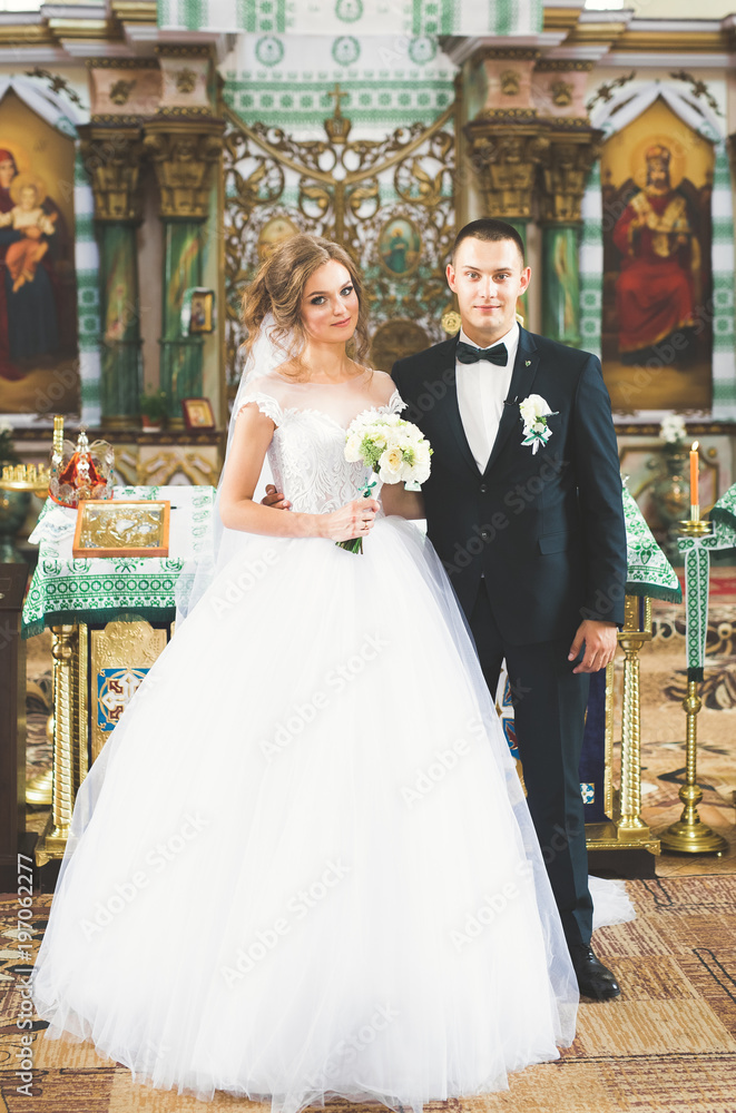 Wedding couple bide and groom get married in a church Wedding couple bide and groom get married in a church