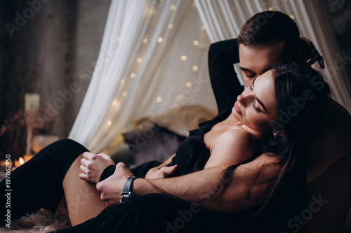 Romantic intimate photo session of a young couple. photo