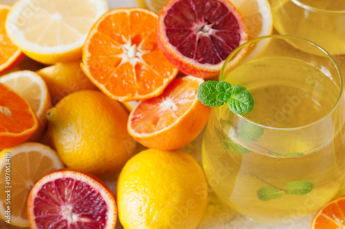 Detox citrus water  refreshing summer homemade lemonade cocktail with lemon and orange