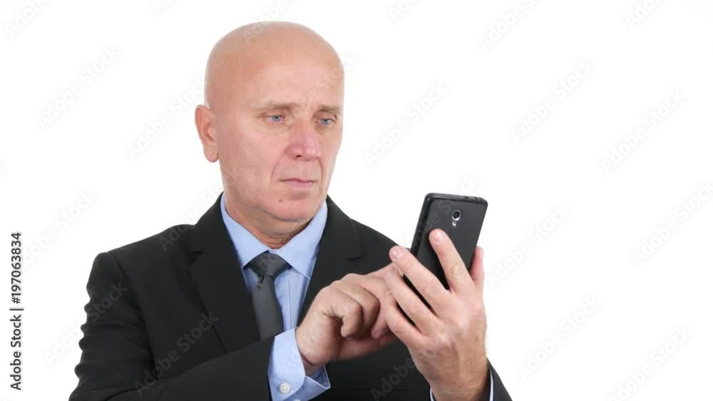 Serious Businessman Interior Office Room Talking to Cellphone Serious Businessman Interior Office Room Talking to Cellphone