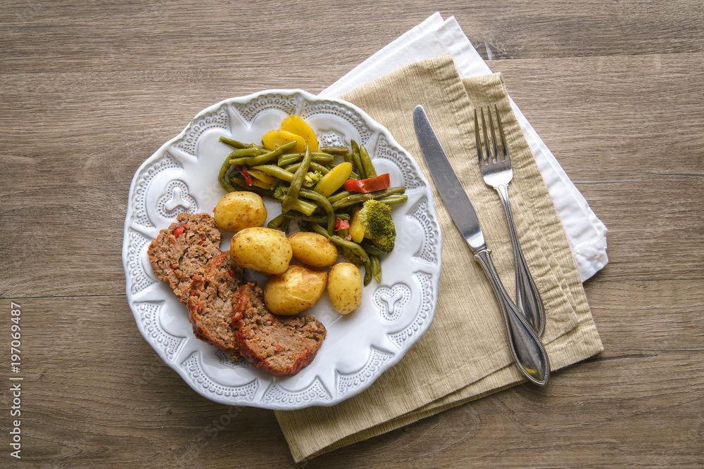 Meatloaf, potatoes and vegetable dinner