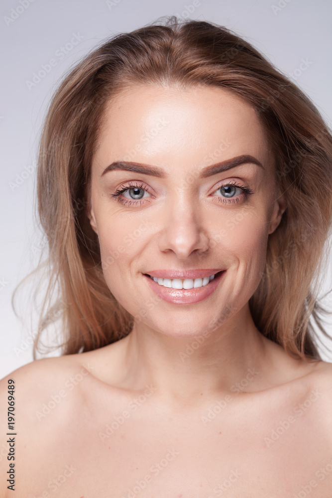 closeup portrait of beautyful blond smiling woman with clean fresh skin closeup portrait of beautyful blond smiling woman with clean fresh skin