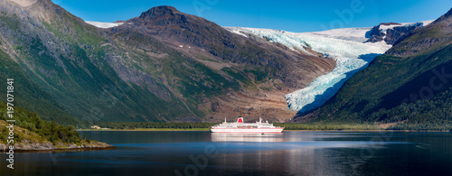 Cruise ship at Svartisen glacier in Norway photo