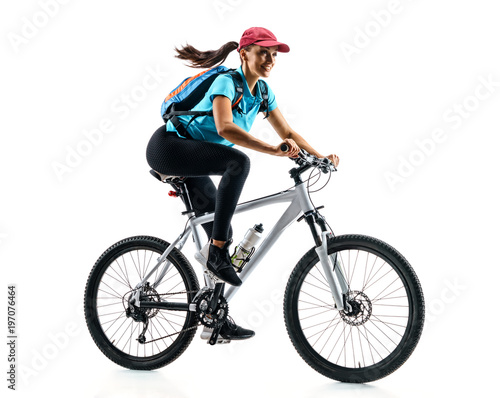 Cyklista jedzie rower w sylwetce na białym tle w błękitnej koszulce. Dynamiczny ruch. Sport i zdrowy styl życia