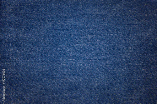 Blue jeans texture. Fabric background. photo