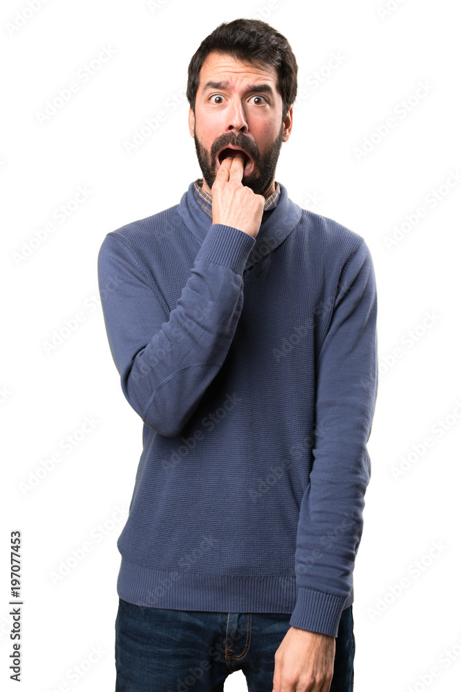 Handsome brunette man with beard making vomiting gesture on white background Handsome brunette man with beard making vomiting gesture on white background