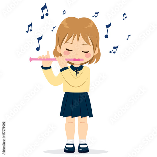 Young cute little girl playing flute enjoying music