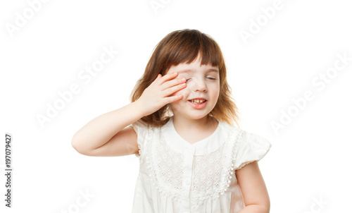 Wallpaper Mural Sleepy girl 4-5 years rubs his eyes on a white background Torontodigital.ca