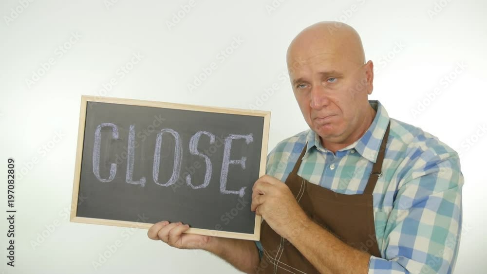 Slow Motion with Upset Person Showing Closeup Chalkboard with Close Message Slow Motion with Upset Person Showing Closeup Chalkboard with Close Message