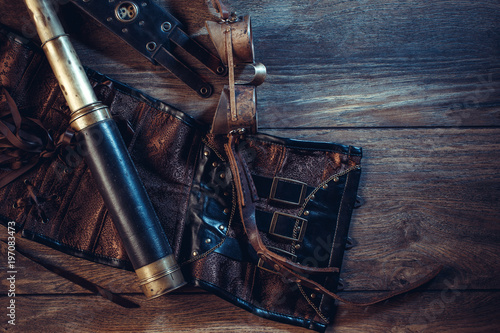 A beautiful still-life in the steampunk style with protective goggles