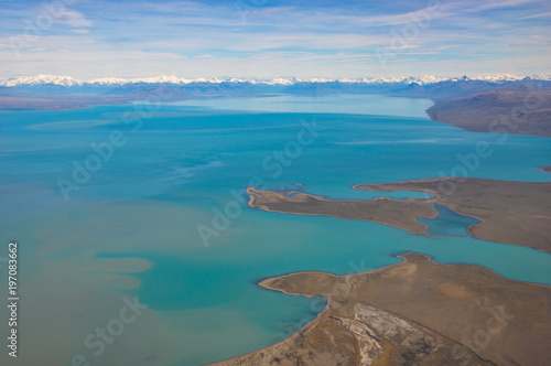 aerial view of the shore line of lake Lago Argentina near El Calafate and the andes in the back, Patagonia, Argentina