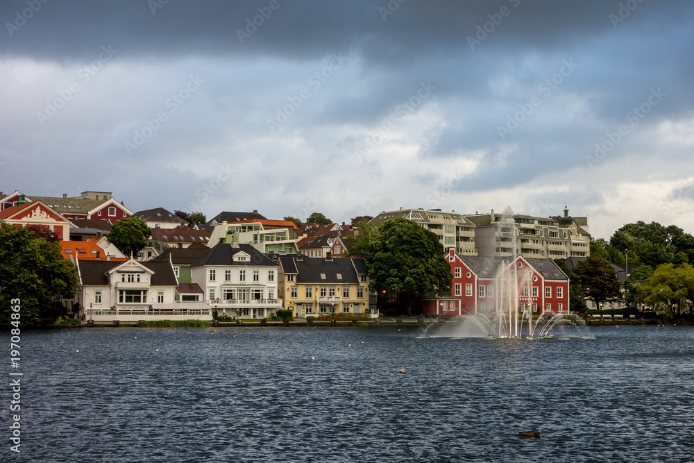 Buildings with waterworks near the Breiavatnet lake in Stavanger
