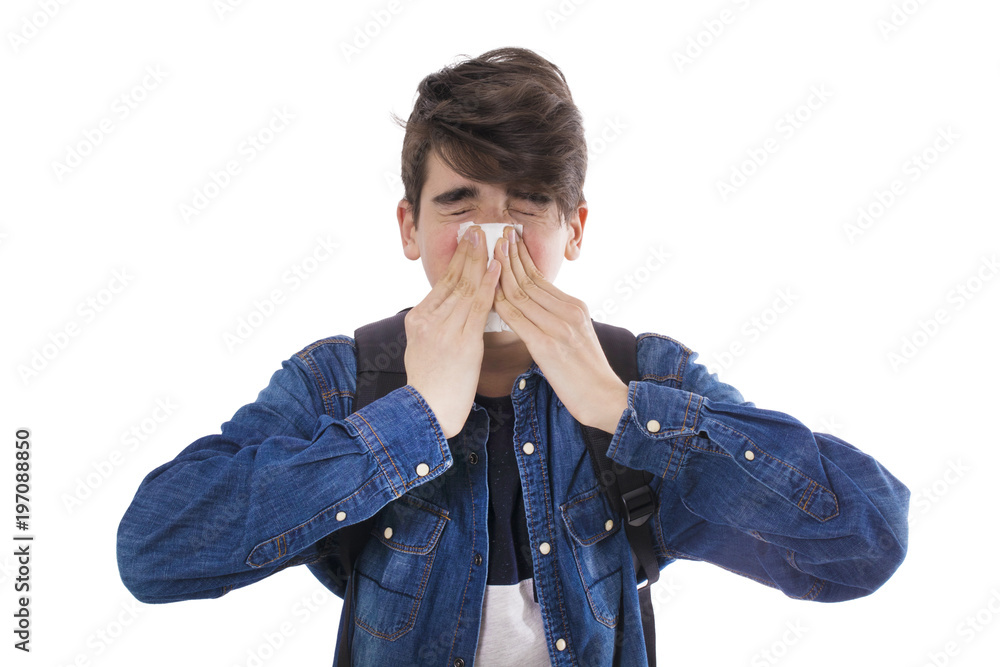 child or young boy sneezing with isolated handkerchief on white background child or young boy sneezing with isolated handkerchief on white background