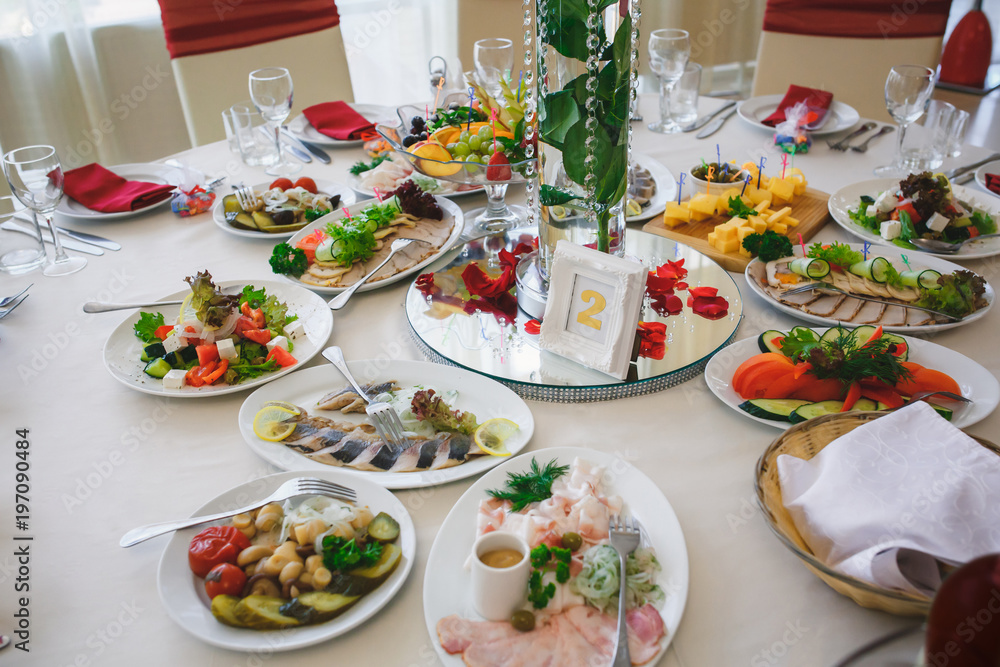 food on guests table in restaurant at event party food on guests table in restaurant at event party