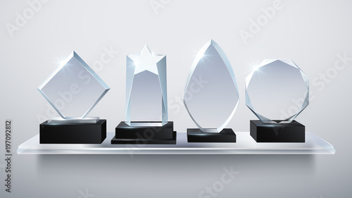 Realistic glass trophy awards, transparent diamond winner prizes on shelf vector illustration