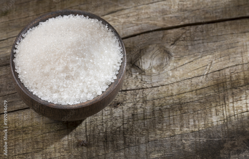 White refined sugar in the bowl White refined sugar in the bowl